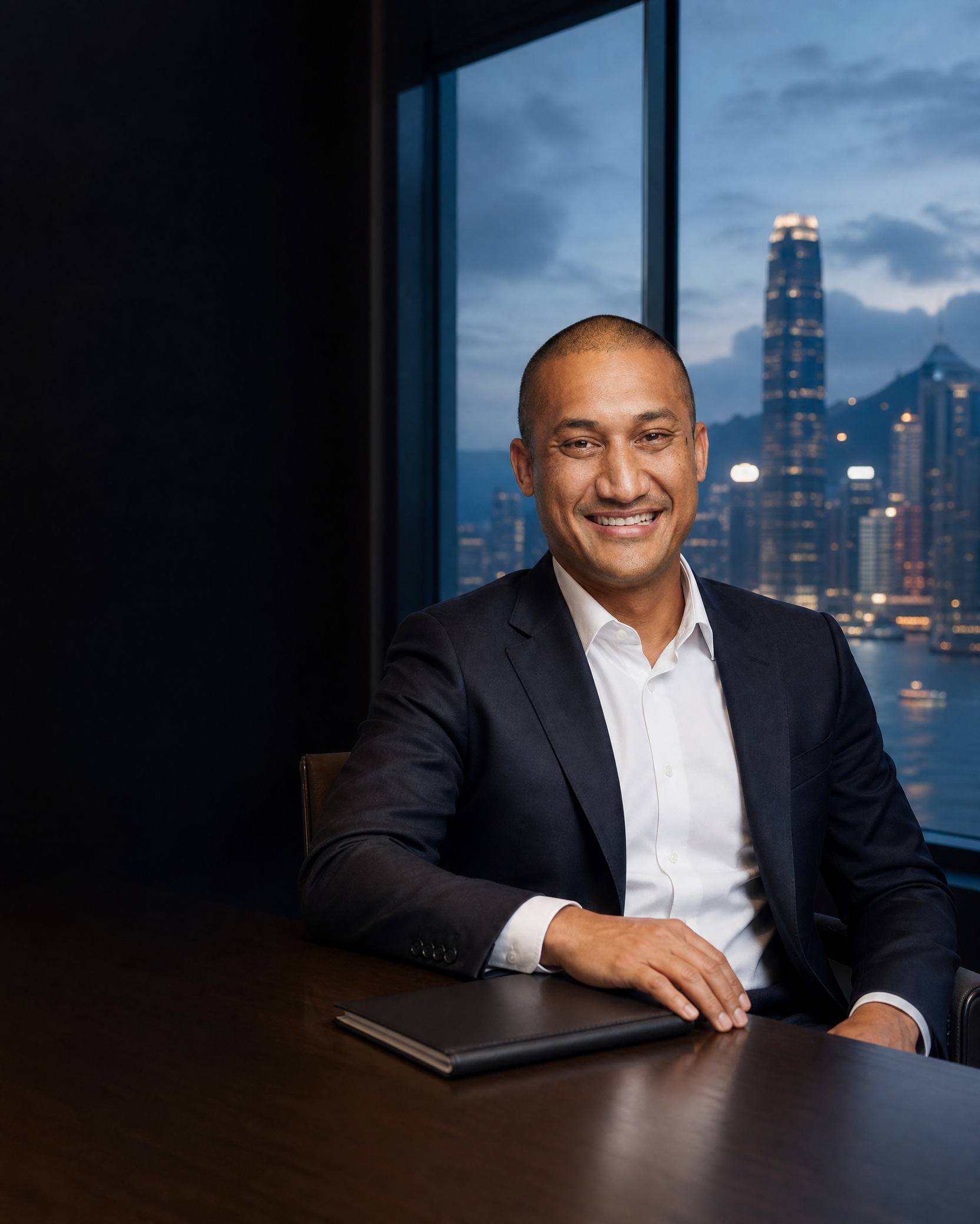 Olivier Adolphe seated in a Hong Kong boardroom